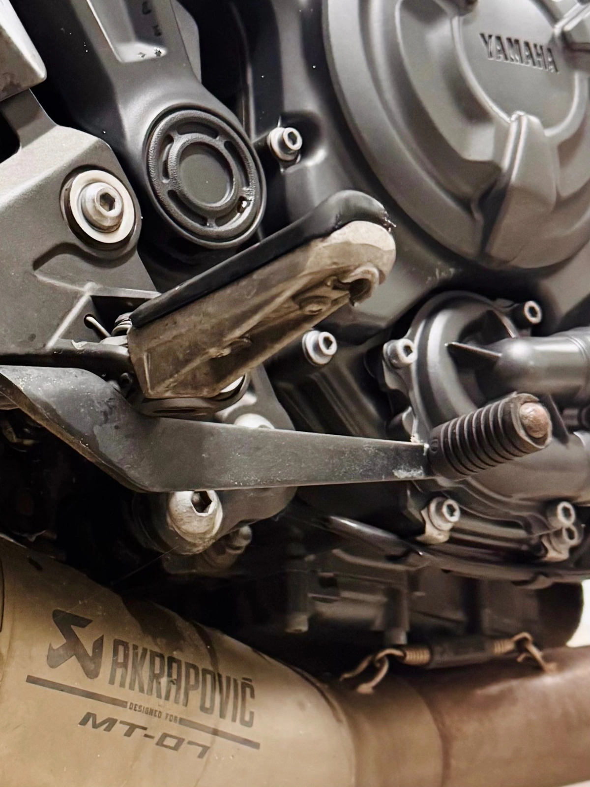 Close-up of Yamaha MT-07 back brake foot pedal controls