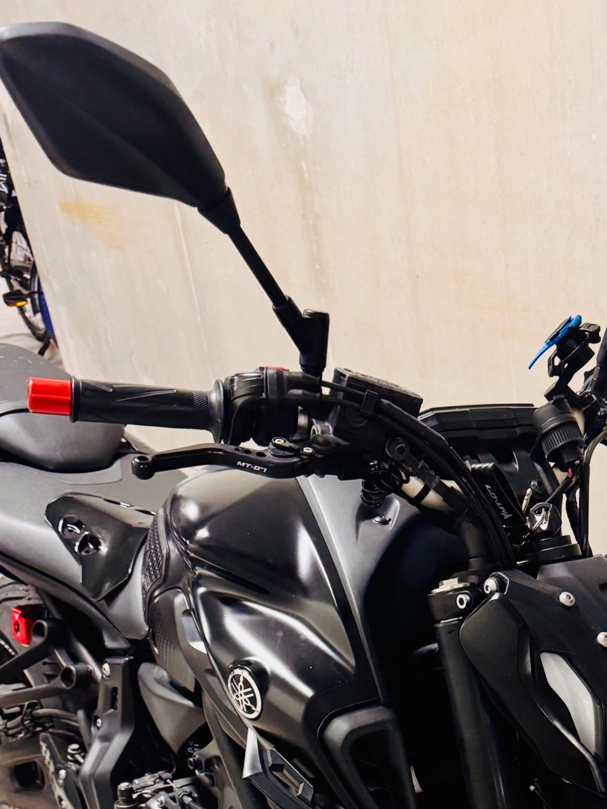 Close-up of Yamaha MT-07 handlebar, front brake lever and controls