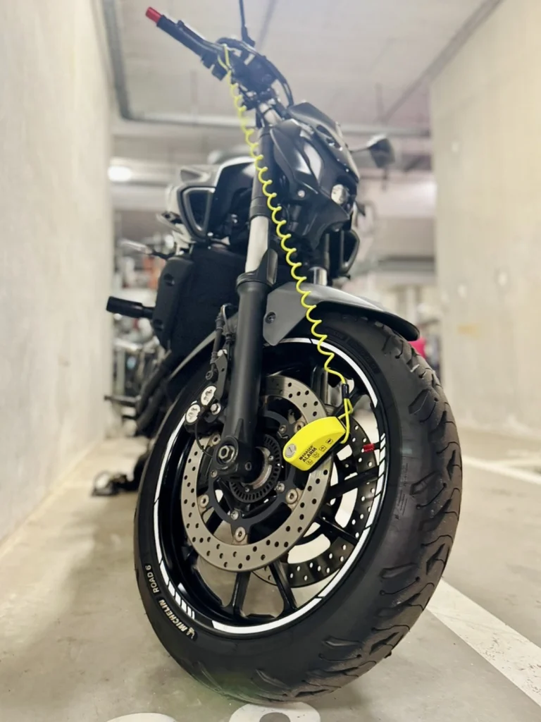 Kraser alarm disc lock attached to the front wheel of a Yamaha MT-07