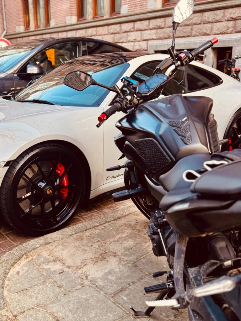 Yamaha MT-07 parked close to cars, showing tight space awareness for motorcyclists
