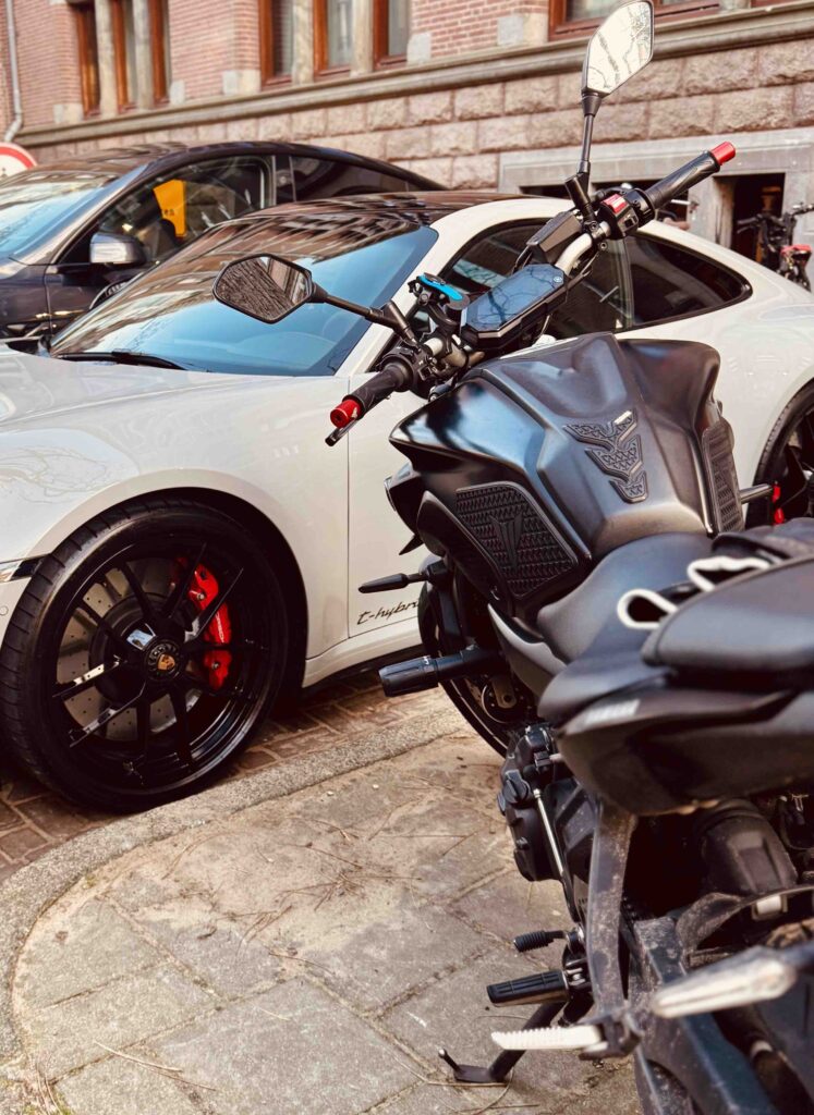 Parked cars showing why motorcyclists should avoid the door zone