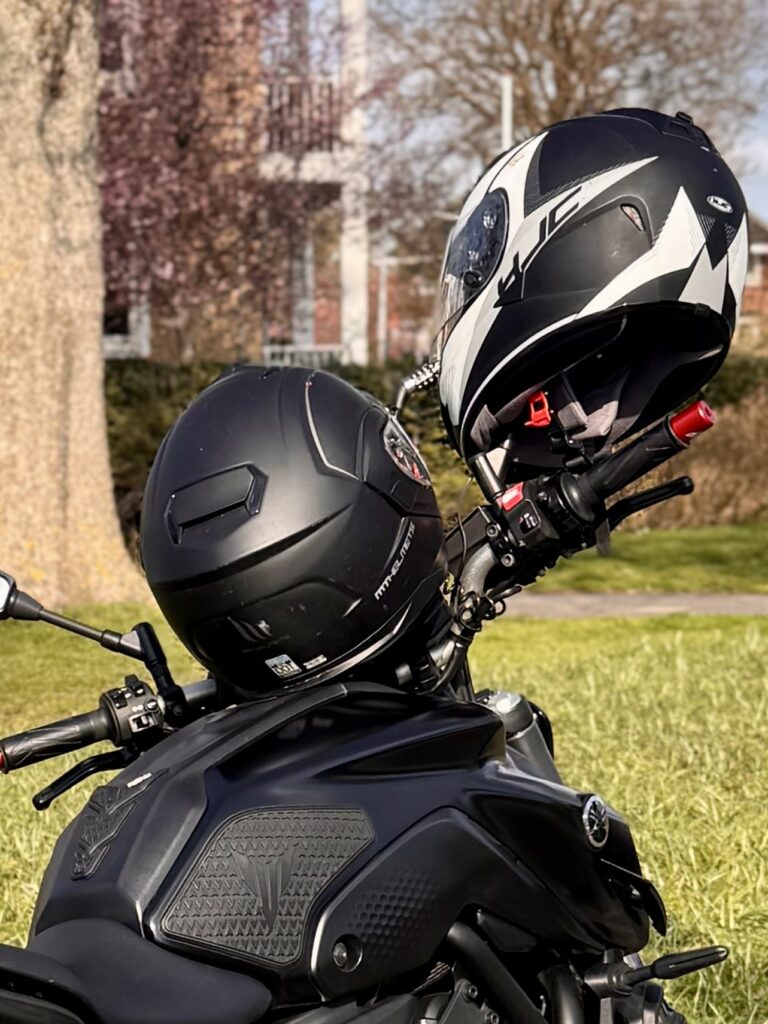 Combination cable lock used for securing helmets on to the motorcycle handlebar