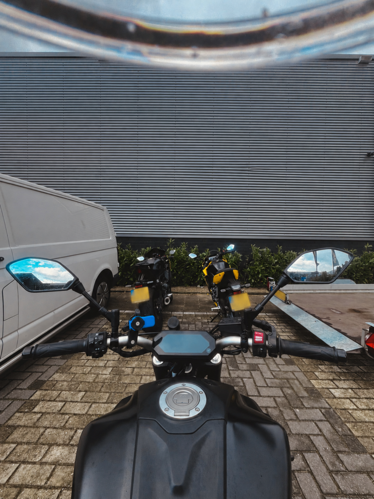 Motorcycle rider view showing how to avoid target fixation by looking ahead