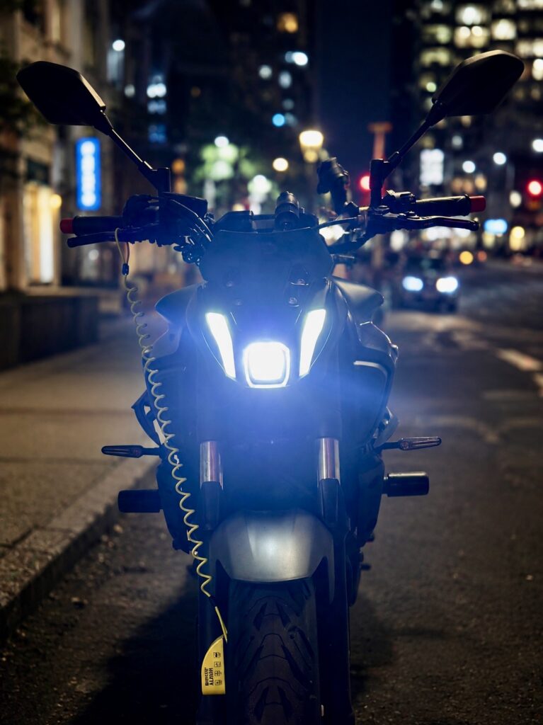 City traffic scene showing motorcycle vision techniques for urban riding