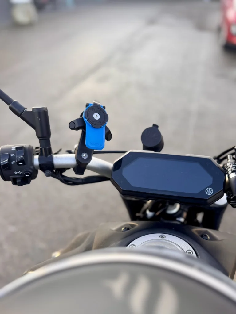Quad Lock phone mount installed on the handlebar of a Yamaha MT-07