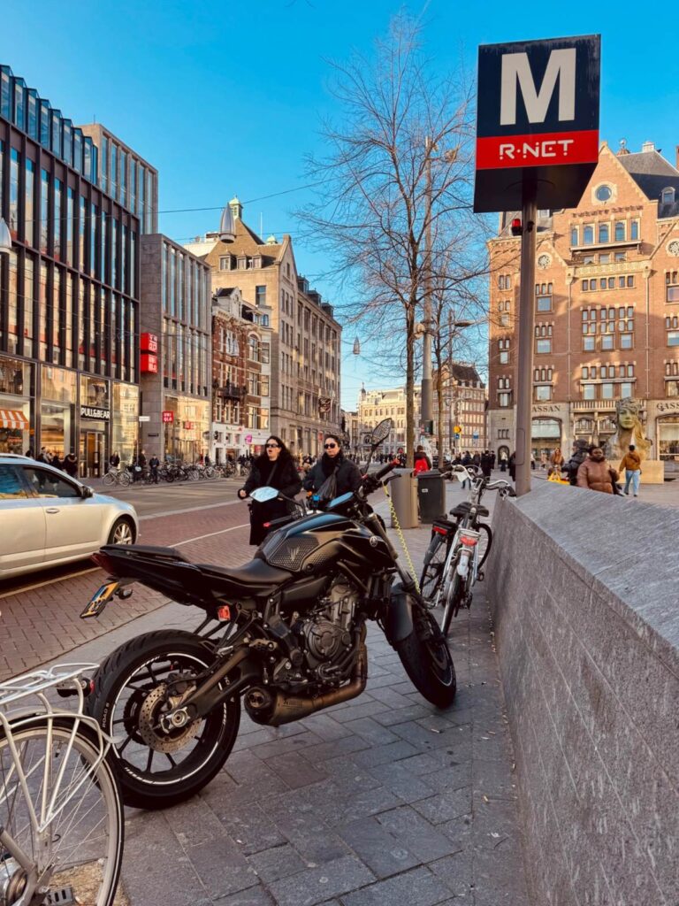 Yamaha MT-07 parked on a busy Amsterdam street near metro line