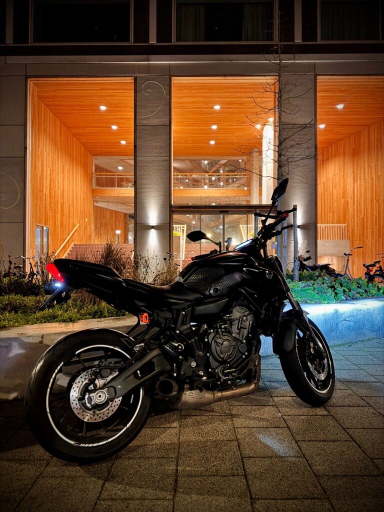 Yamaha MT-07 at night with headlight on