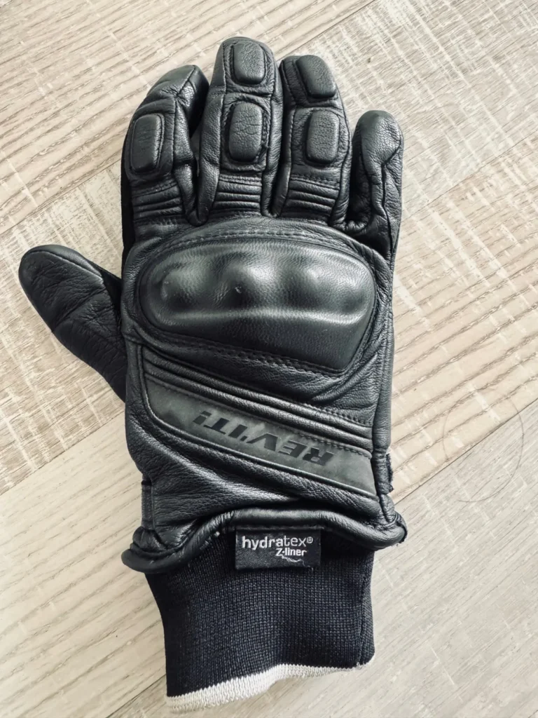 Top view of a black Rev’It Boxxer 2 H2O motorcycle glove with knuckle protection