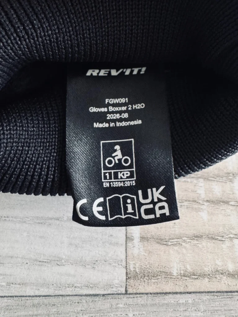 CE label showing knuckle protection safety standard in motorcycle gloves