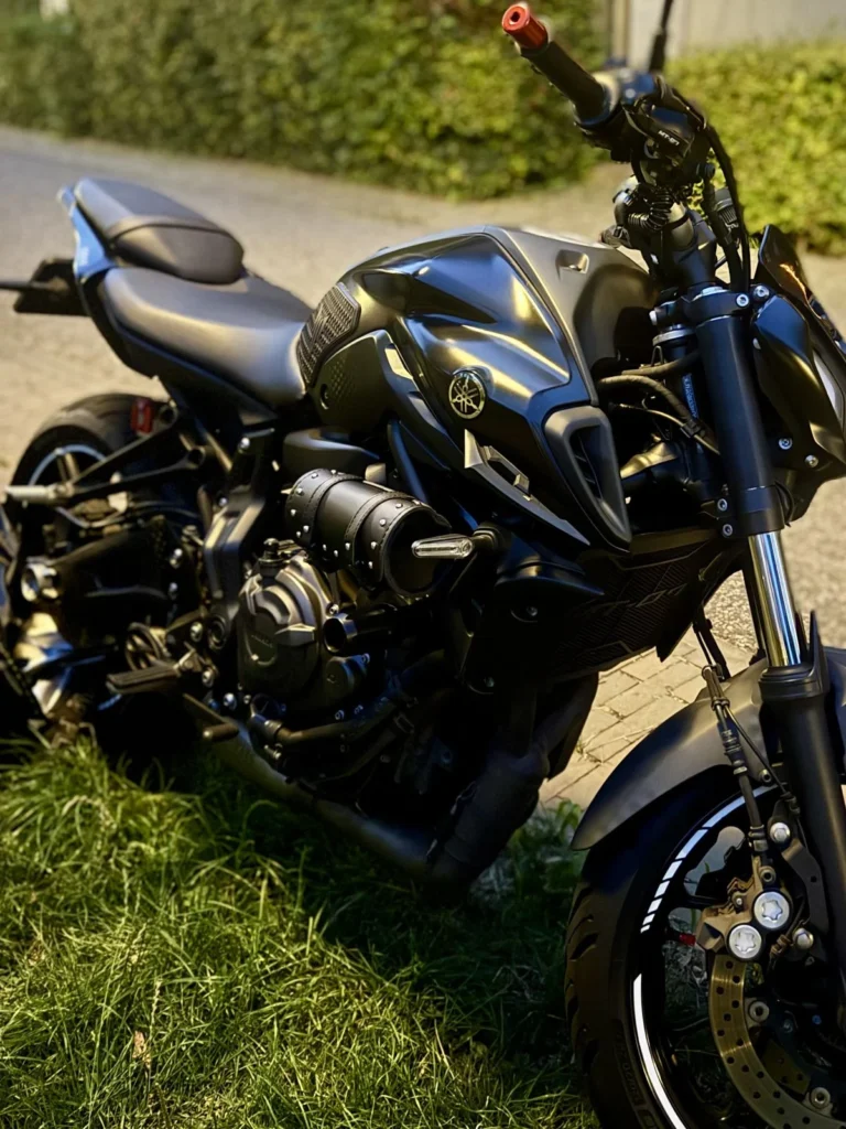 Yamaha MT-07 with a small black tool bag mounted on the side of the motorcycle