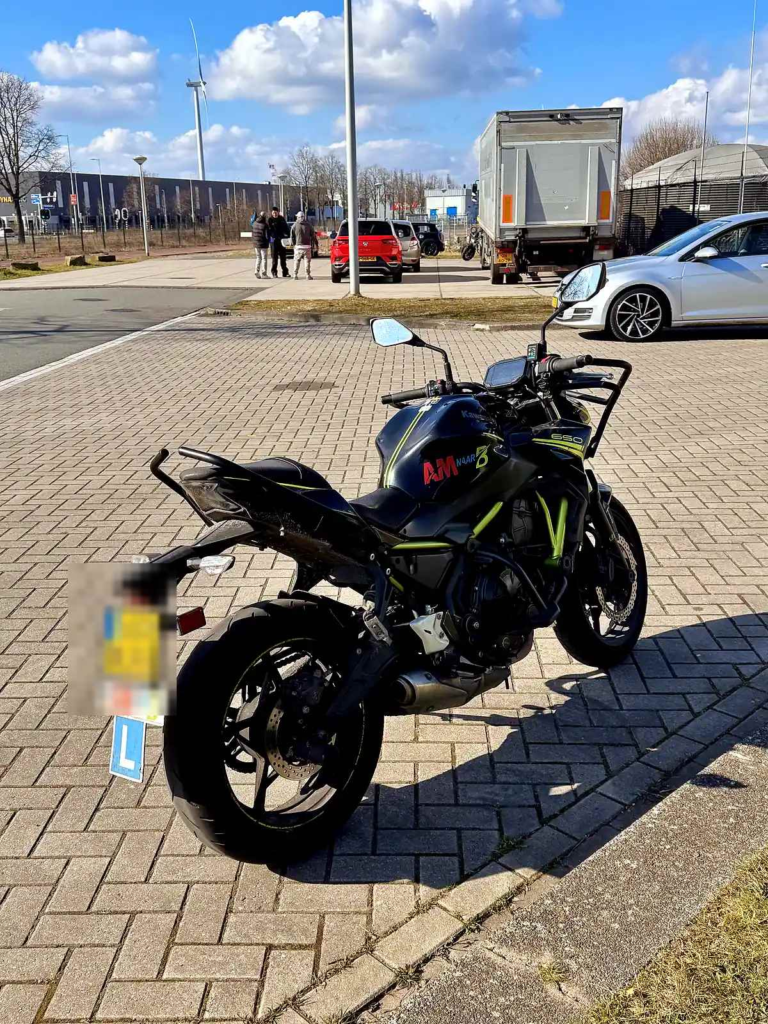 Training motorcycle parked near a practice area before beginner balance exercises