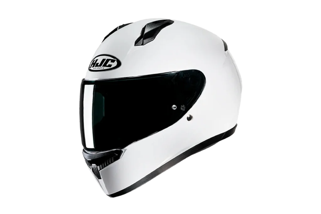 White HJC C10 full-face motorcycle helmet with clear visor on transparent background