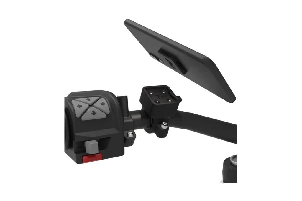 Oxford CLIQR OX850 handlebar mount with compact black quick-release phone adapter beside motorcycle controls