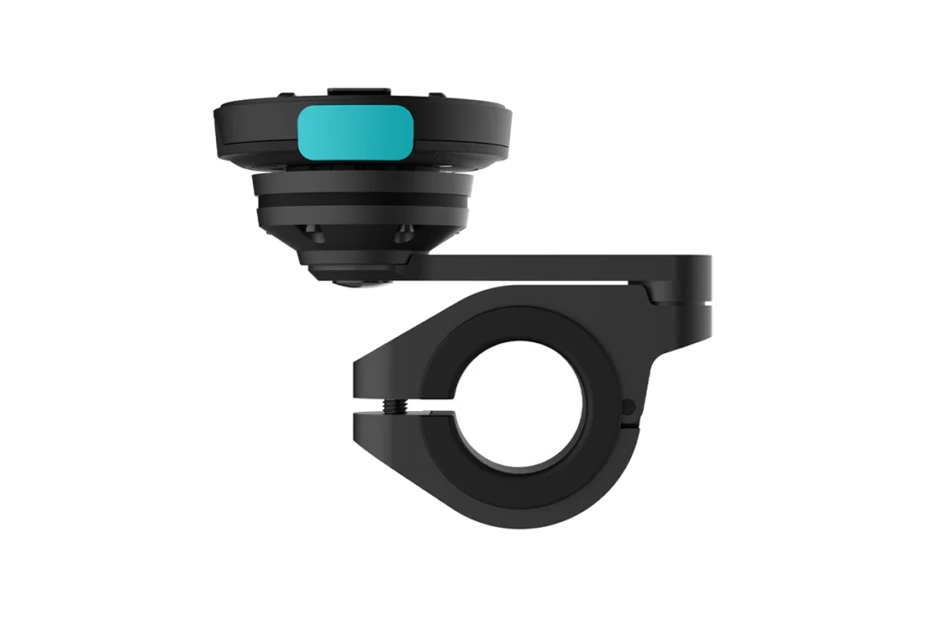 Mous IntraLock motorcycle bar mount with black handlebar clamp, vibration dampening head, and turquoise release button